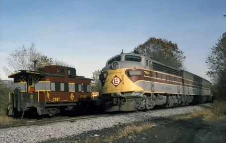 F unit passing caboose