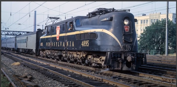 GG1 locomotive pulling passenger train