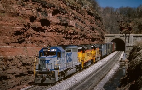 CSX freight exiting tunnel