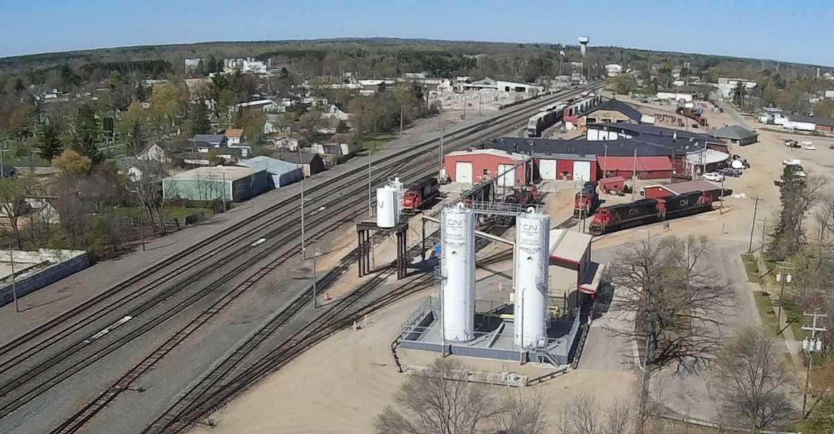 Roundhouse and fuel. CN shows 'Safety is our Fuel to Success'.