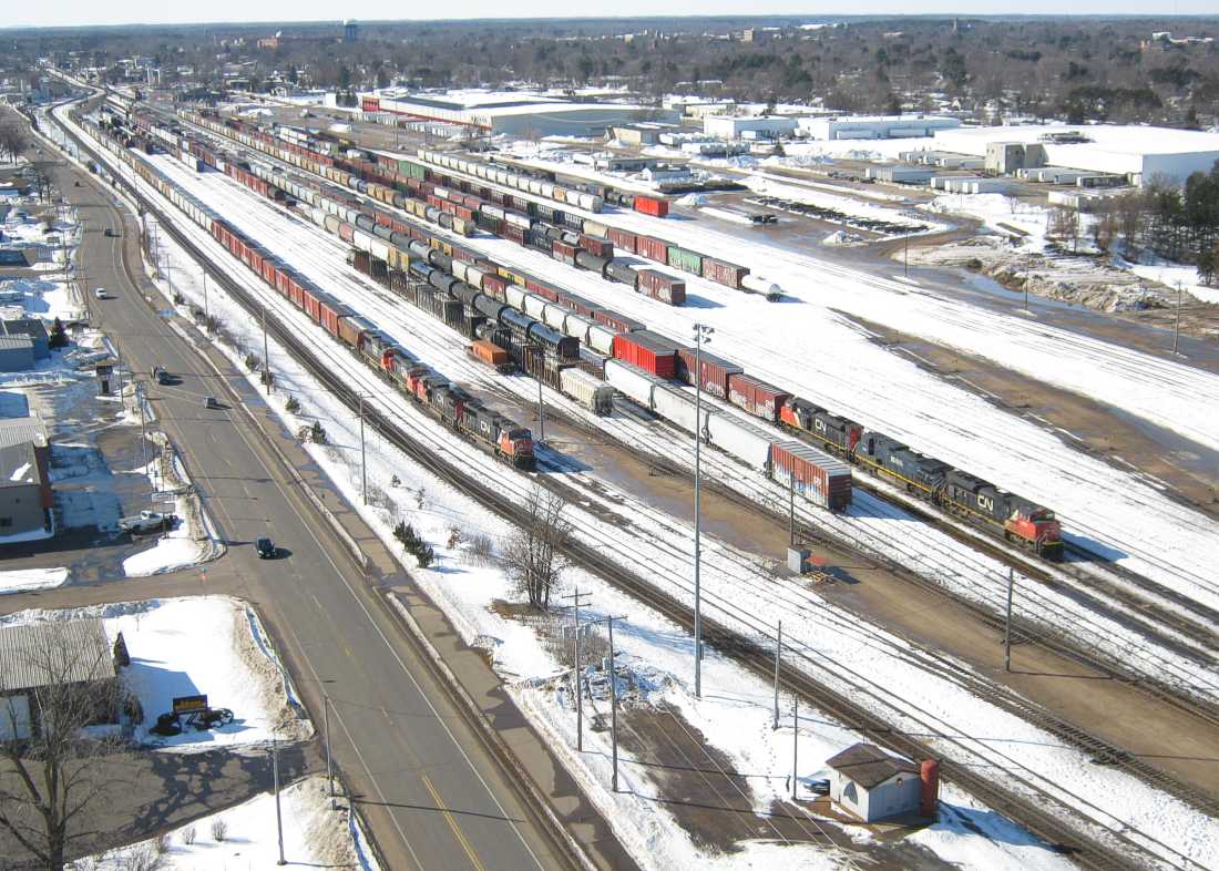 I see two more red cars. I am guessing they are air compressor cars for