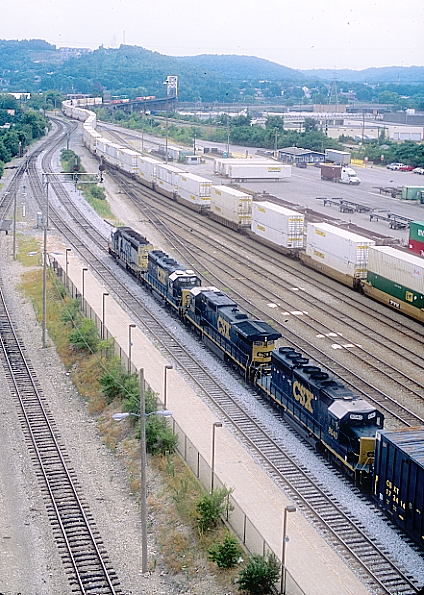 CSX 8040-7524-8305-8048 on a southbound mult-level train await departure at the "Tower A" signal.