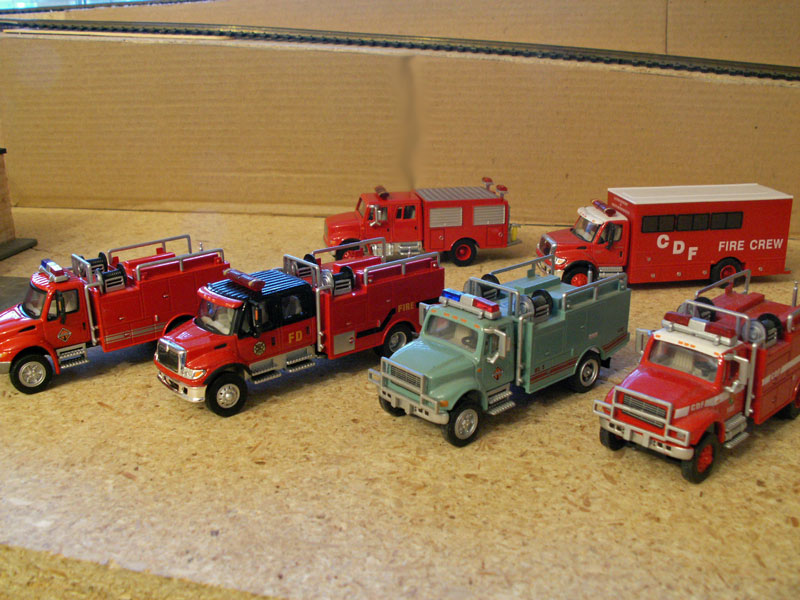 Fleet of brush fire trucks and crew trucks on standby for wildfires