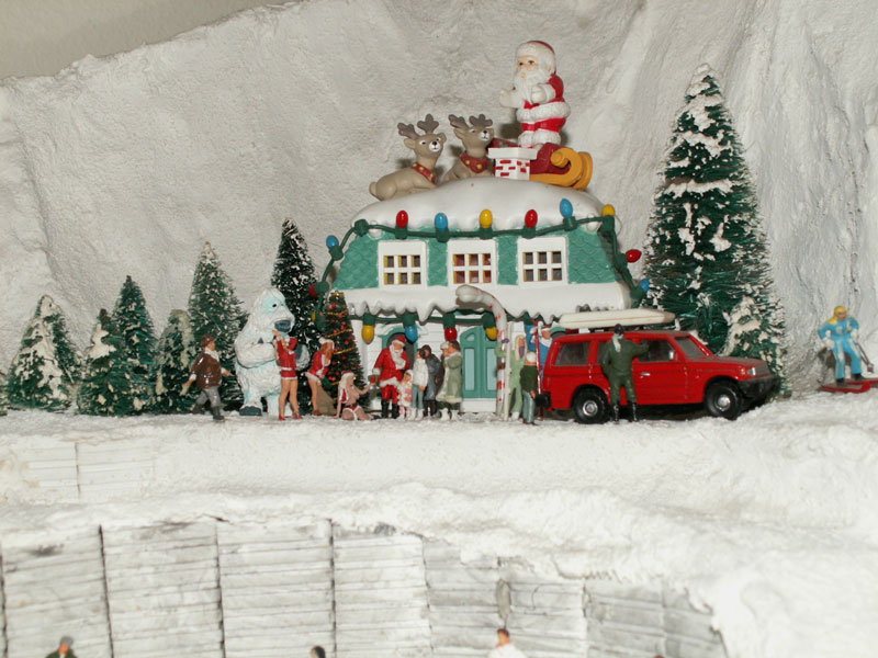 The Wolf Mountain Ski Lodge is decorated for Christmas with a decorative Santa 