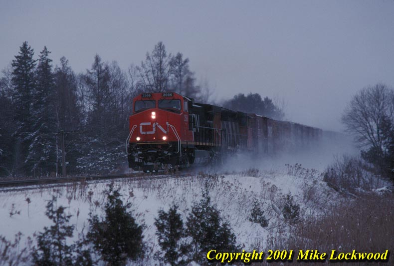 CN 2566 and 5241 on #451 Zephyr Jan.10, 1999 @ 1533
