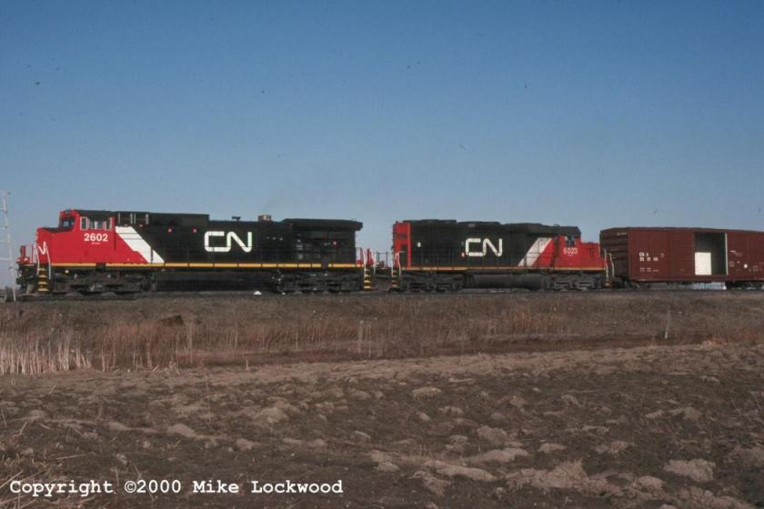 CN 2602 and 6023 on #384 Mar 27/99 @ 16:28