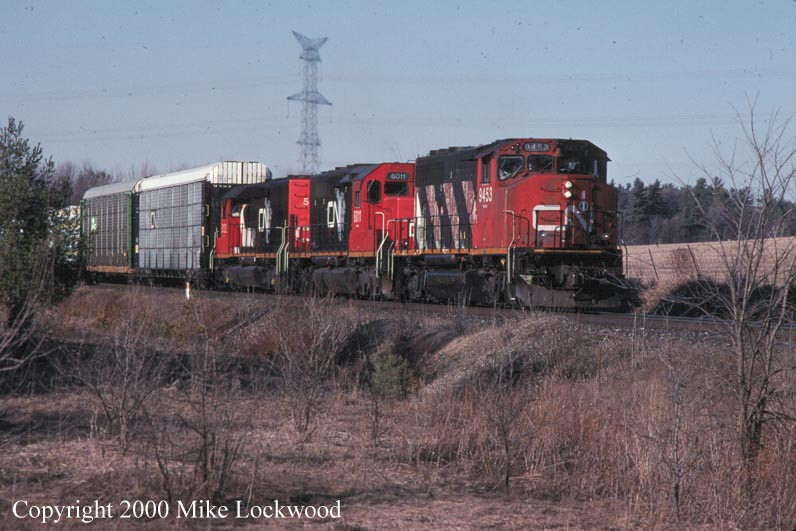 CN 9453, 6011, and 5132 on #383 Mar 27/99 @ 16:44