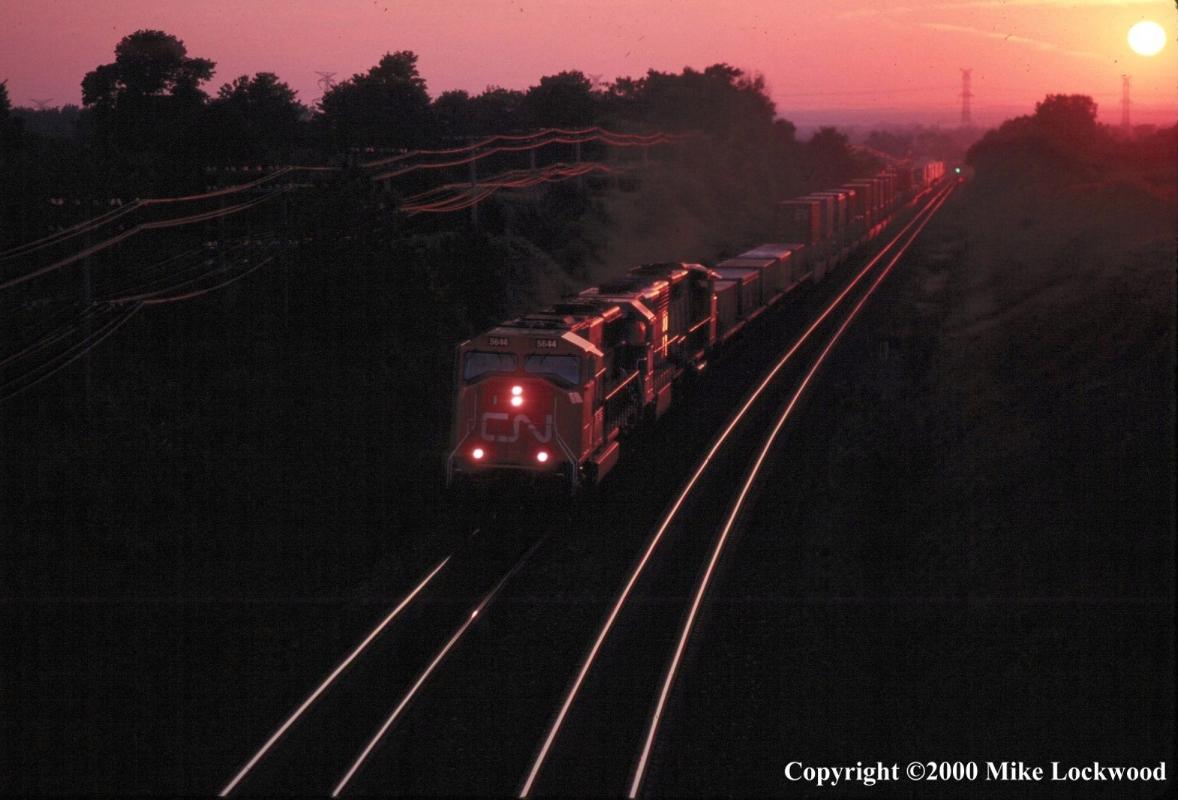 CN 5644, cr6658, and a GP40-2W