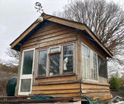 Barnstaple Town former L&BR signal-box in privater garden in 2023