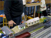 A service station, a house and another building were set up on a module on the accessory side of the modular layout.