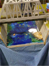 The scenery on this bridge module has been improved by adding figures engaged in fishing  and swimming activities.