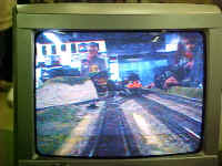 The New Haven EP 5 electric locomotive approaches the train cam video camera. Bill Johnson is in the background.