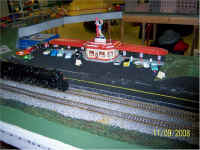 RASG's new American Models northern class locomotive is traveling past THE WNYSSA drive in restaurant scene.