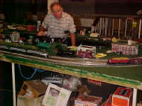Ed posed the NYC passenger consist, NYC snow plow and an American Flyer Christmas locomotive made by Lionel for this shot.